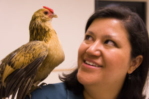 Kristy with a chicken on her shoulder