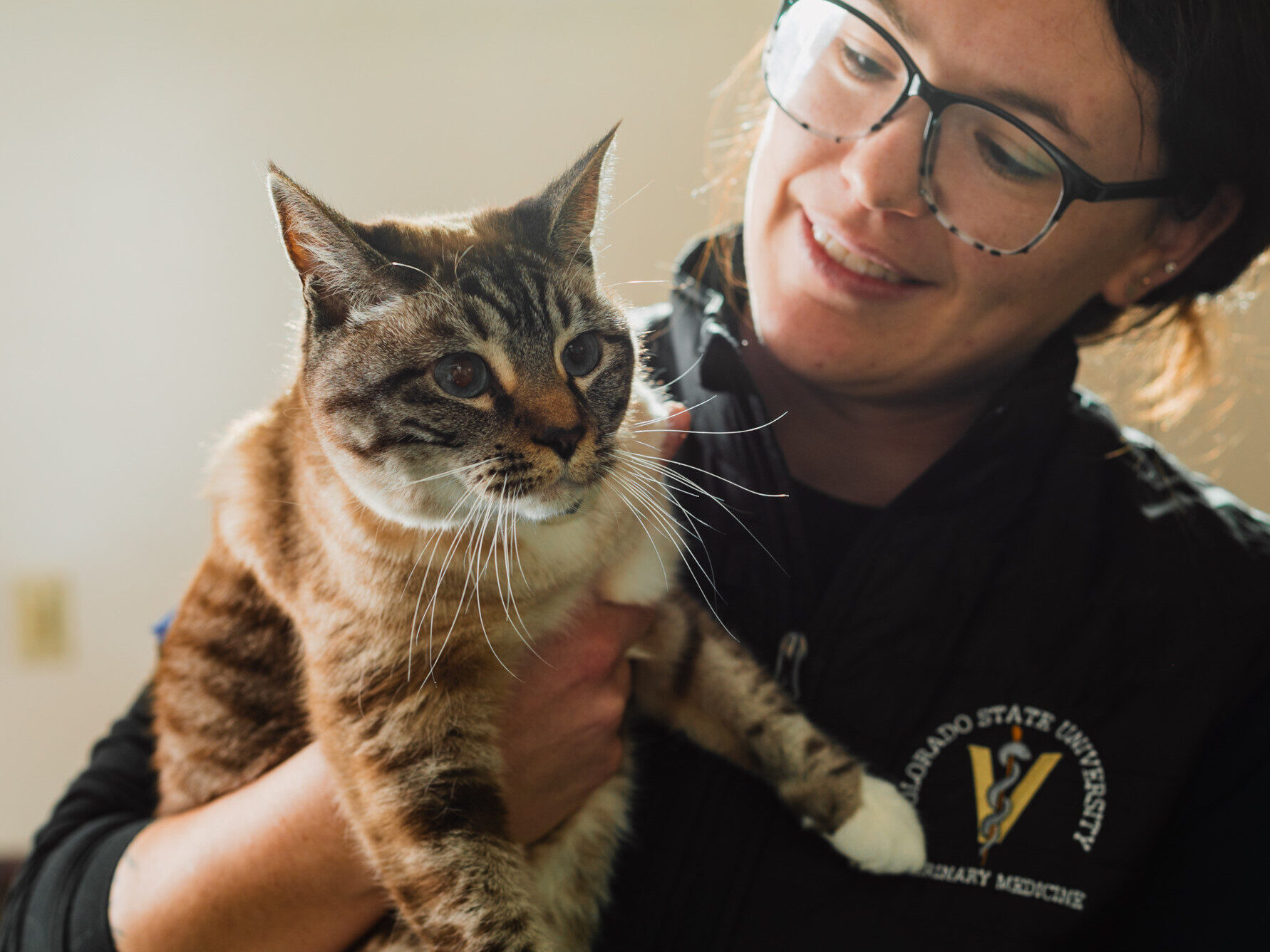 A pet with their owner at at the Veterinary Teaching Hospital
