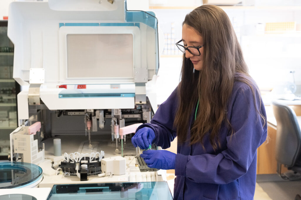 Processing a sample in the clinical pathology lab in the veterinary diagnostic lab