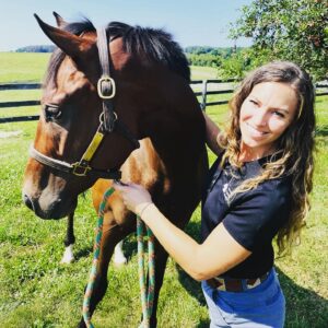Dr. Lauren Luedke with a horse